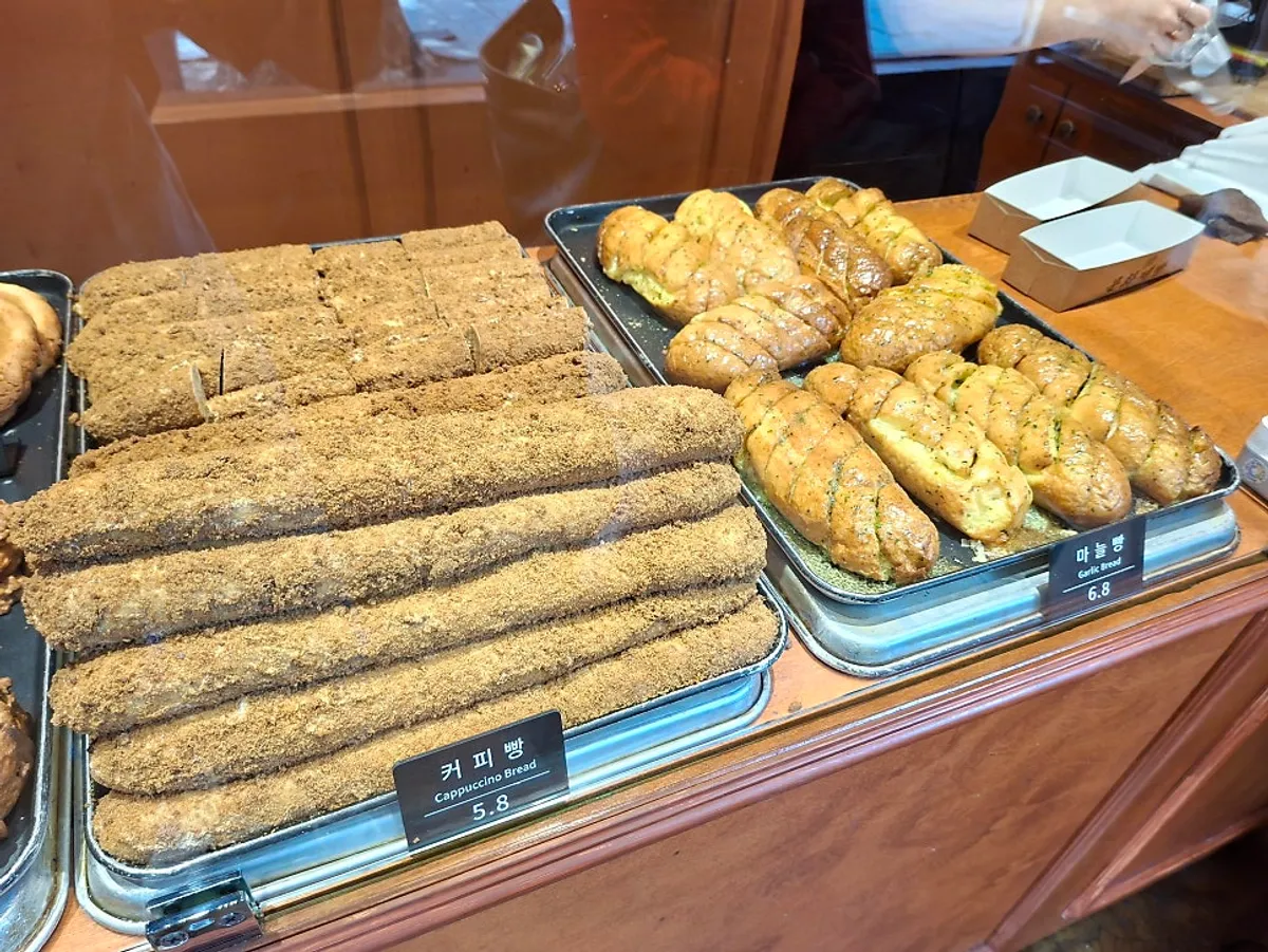 Munhwa Bakery coffee bread placed with coffee at a cafe