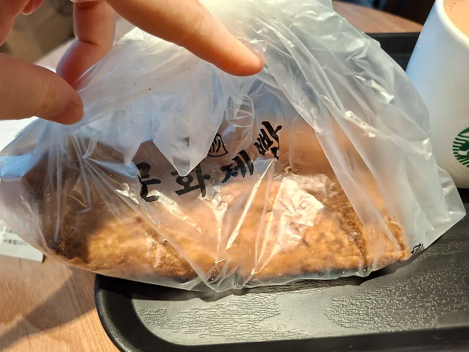 Coffee bread packed cut in half for takeout