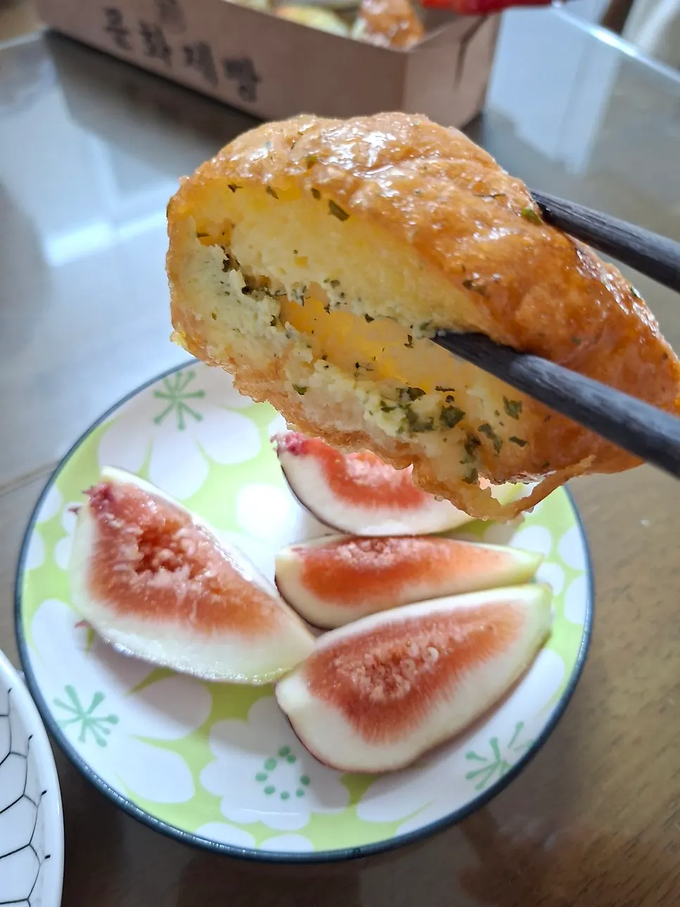 Soft garlic bread enjoyed with a matcha latte