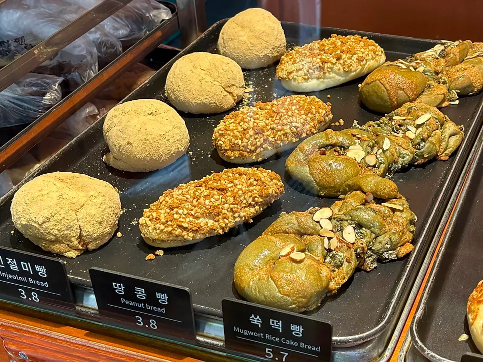 Display of black sesame bread, milk cream bread and squid ink milk cream bread