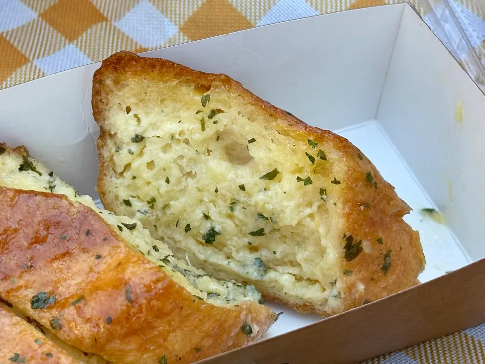 Cross-section of the garlic bread, sliced and packed