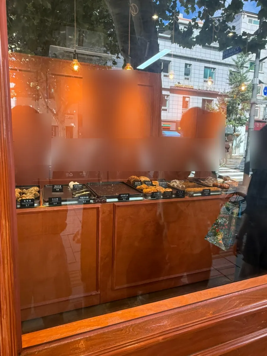 Remaining breads visible through Munhwa Bakery's glass window