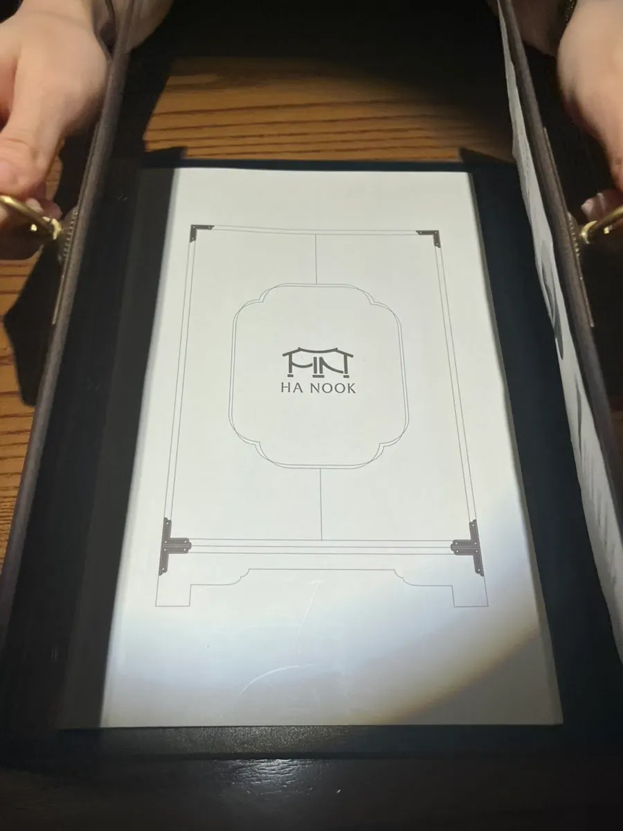 Hanuk's menu shaped like a hanok door