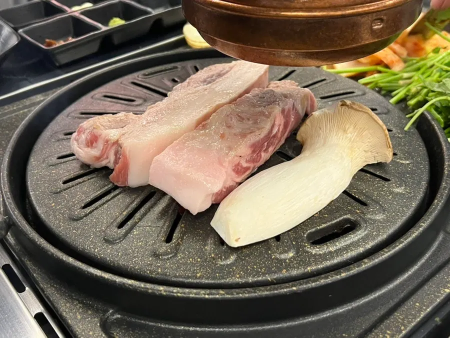 Black pork grilling on the tabletop grill