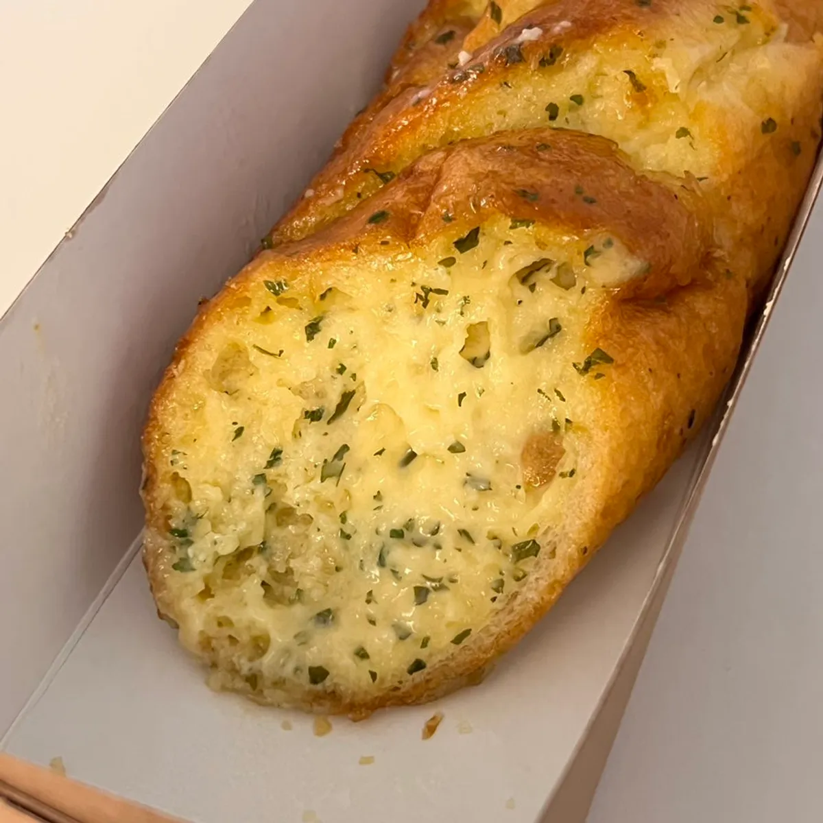 Garlic bread coated with garlic cream