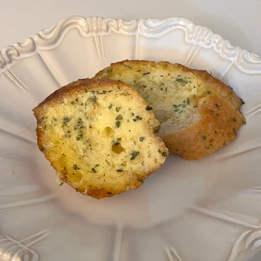 Garlic bread piled high with garlic cream