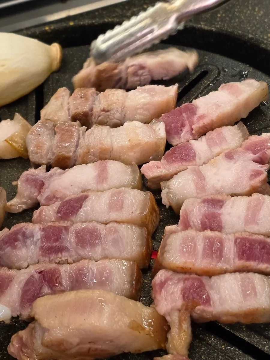 Black pork belly sliced after crisping the outside