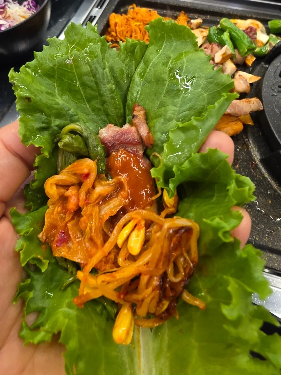 Jirisan black pork belly dipped in sauce