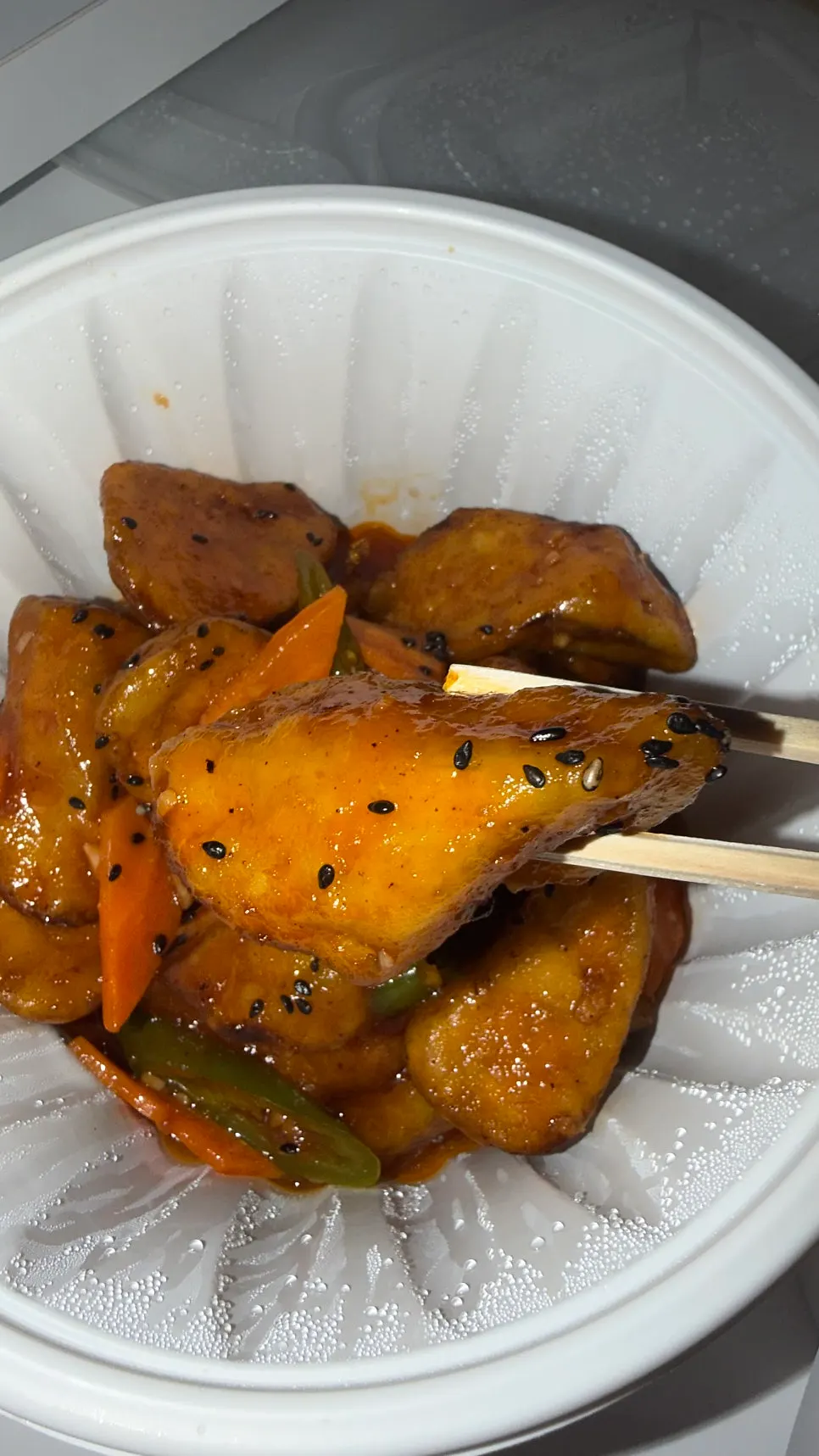 Soft eggplant fry coated generously in sauce