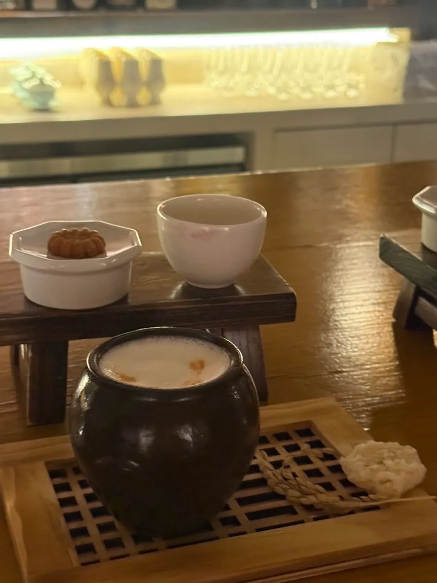 A Hanuk cocktail served with bamboo