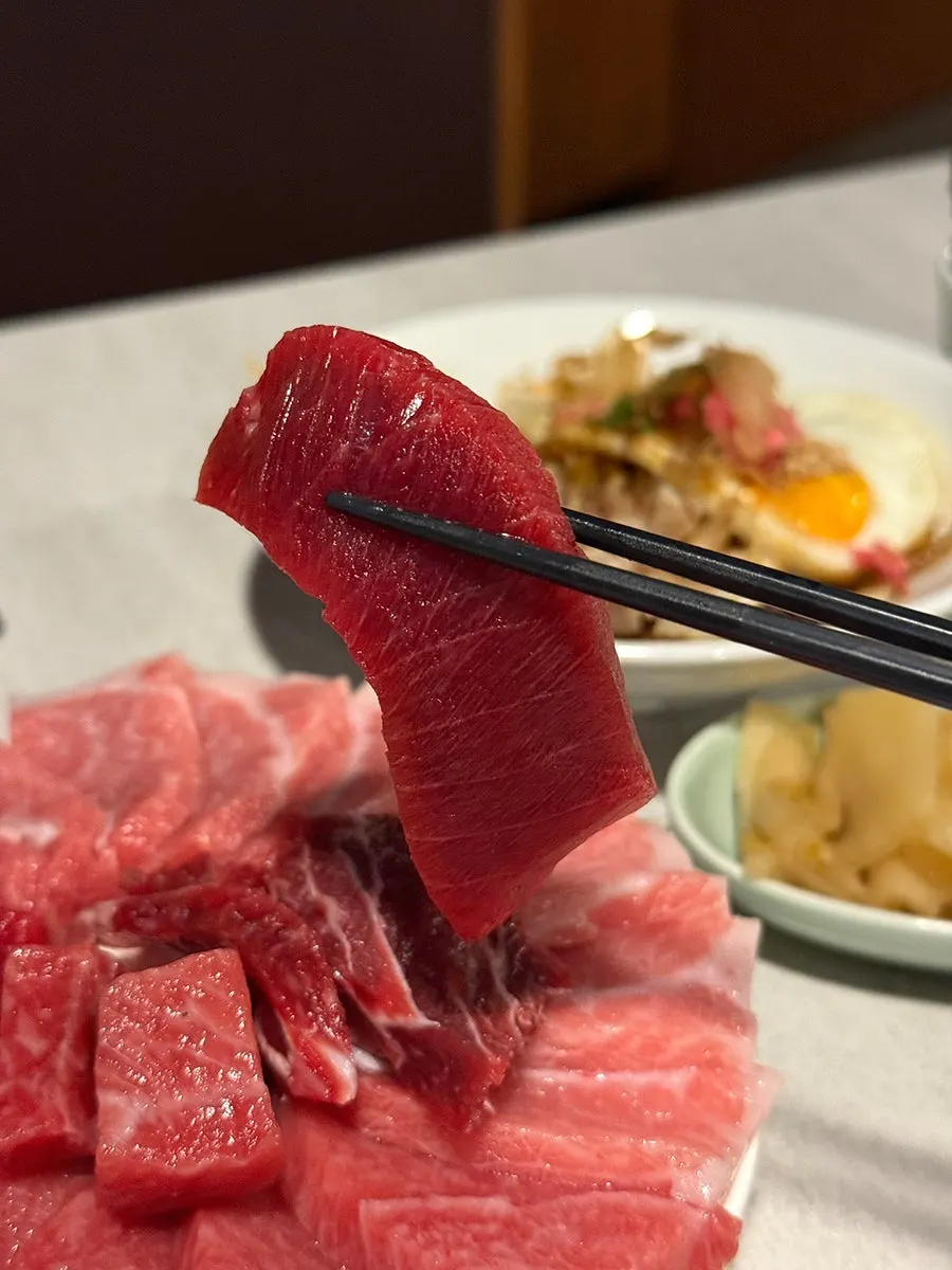 The full plating of the bluefin tuna course for two