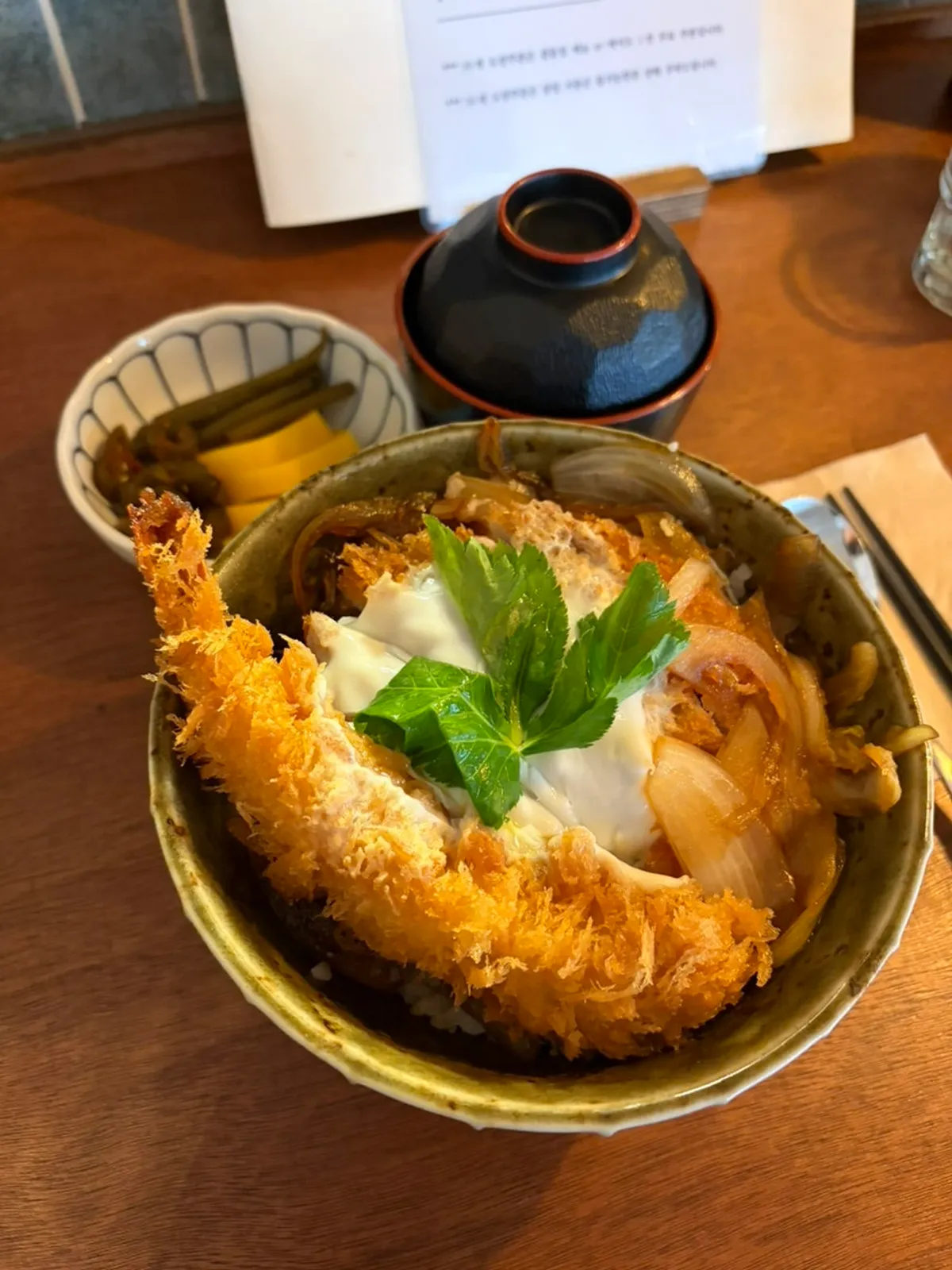 Mix katsu-don with shrimp tempura and pork cutlet served together