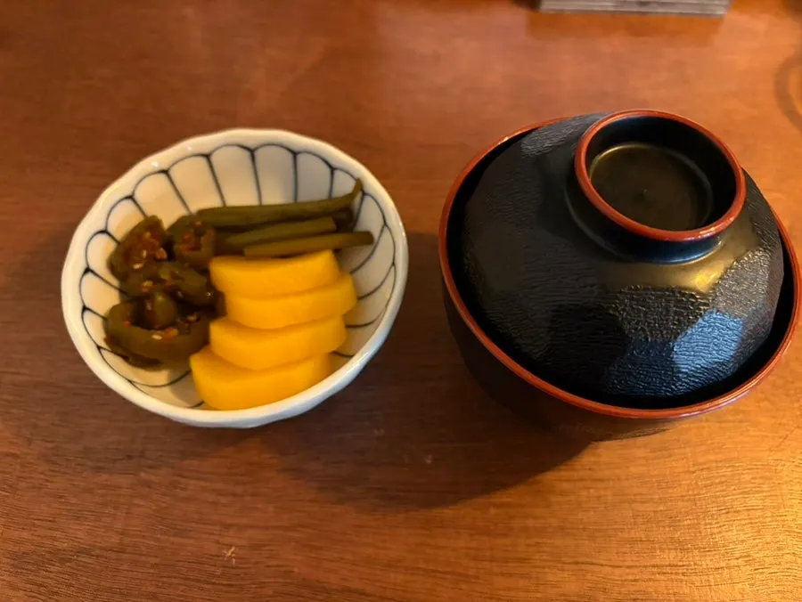 Basic table setting and barley tea at the bar table seat