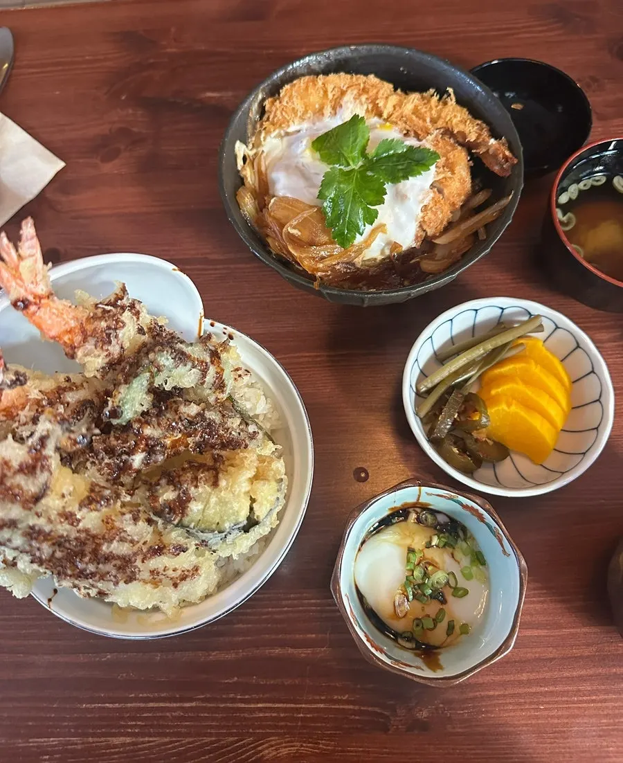 Basic table setting with water, side dishes, and soup