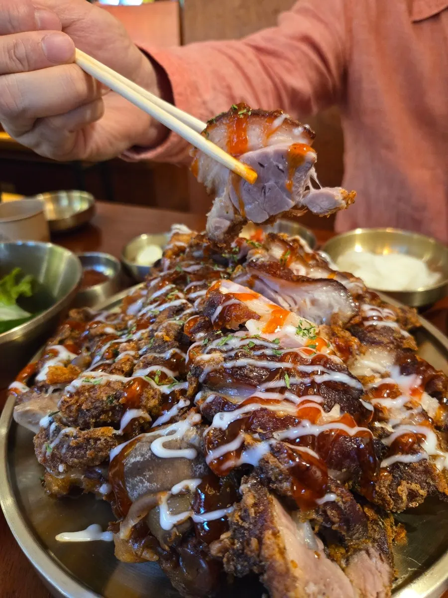 Lettuce and sauces surrounding the banchan spread