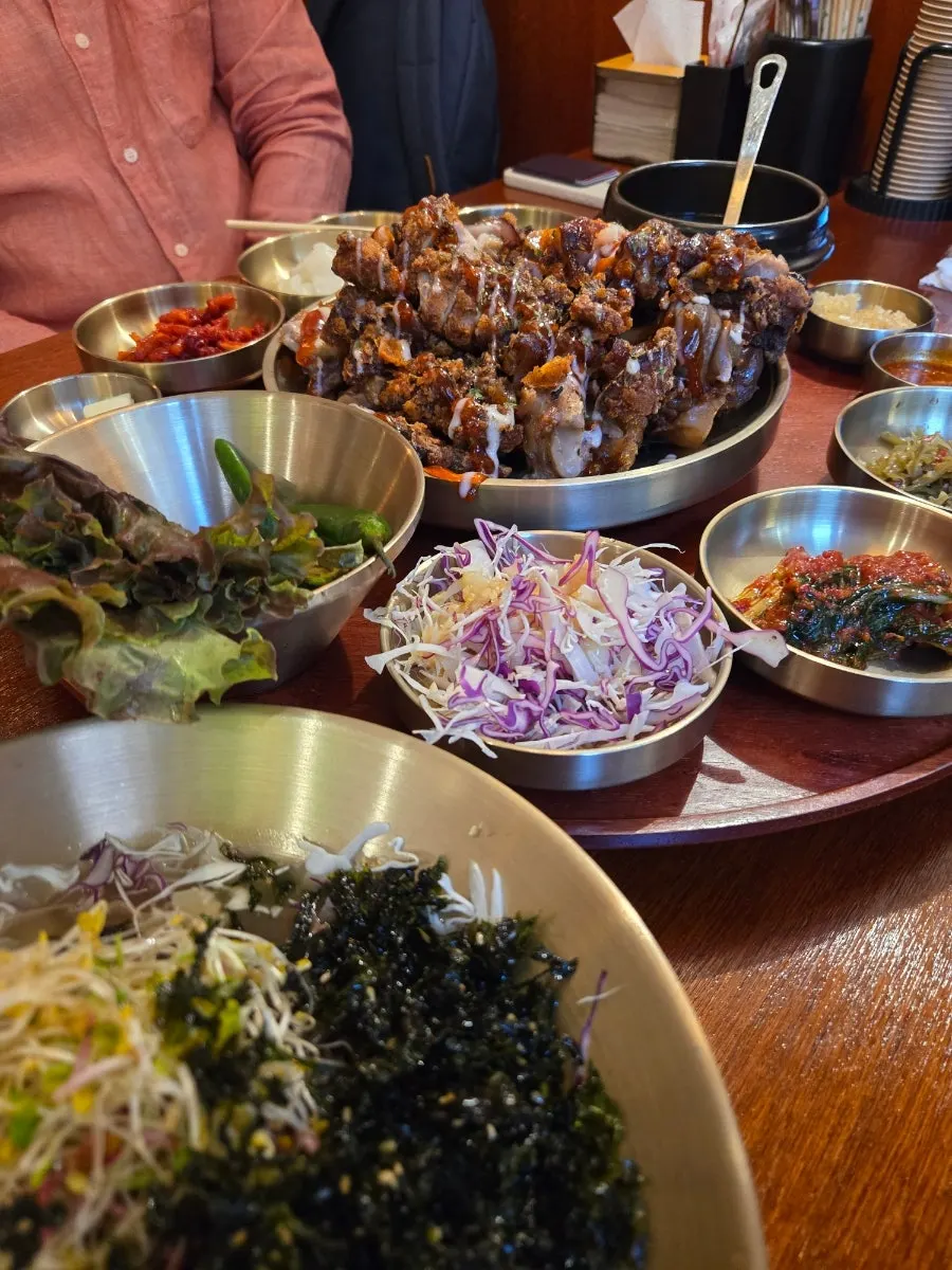 Crispy fried jokbal drizzled with sauce