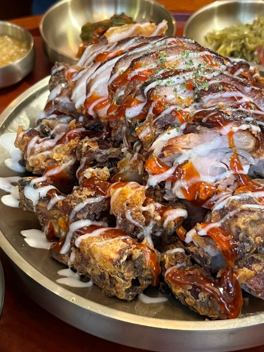 Fried jokbal dipped in special garlic sauce