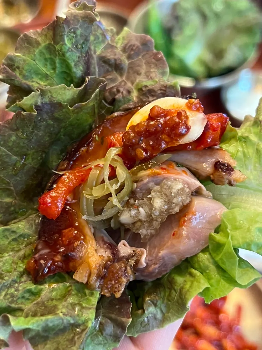 Fried jokbal wrapped in lettuce