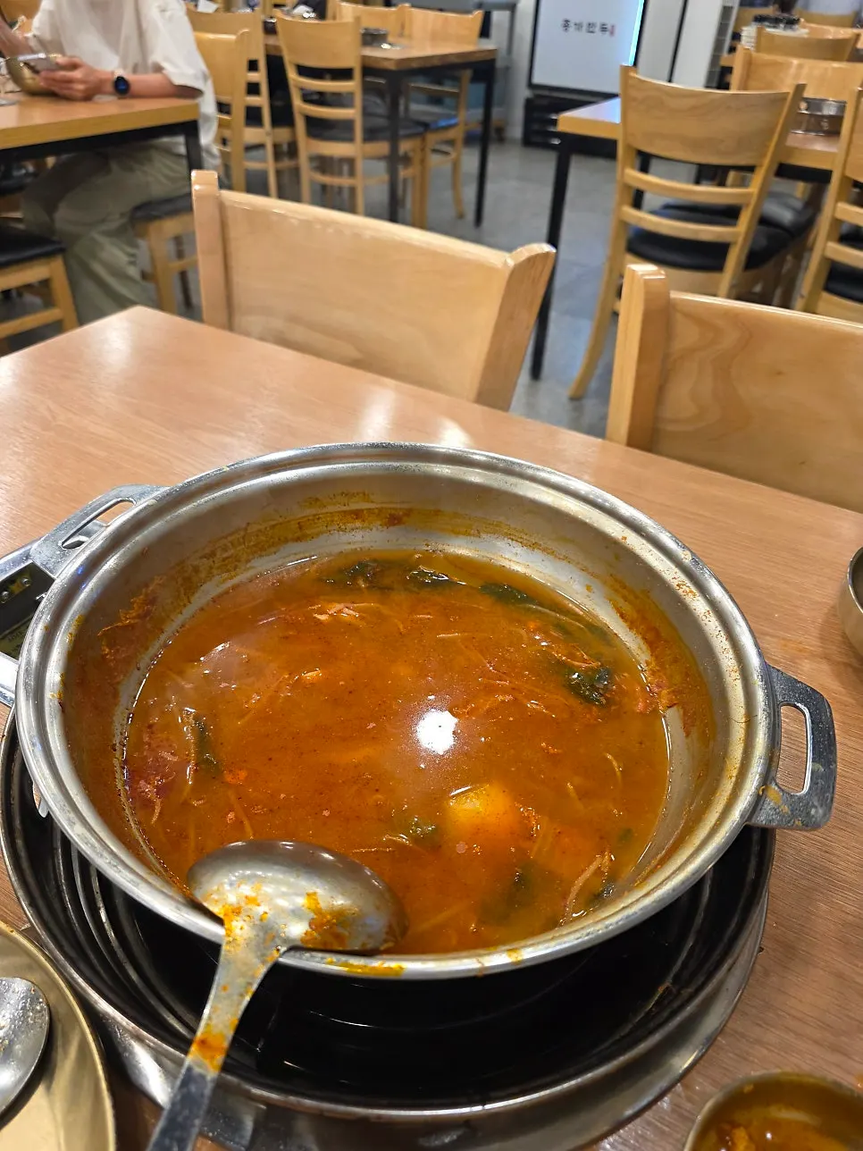 Emptied hot pot and drink at the end of the meal