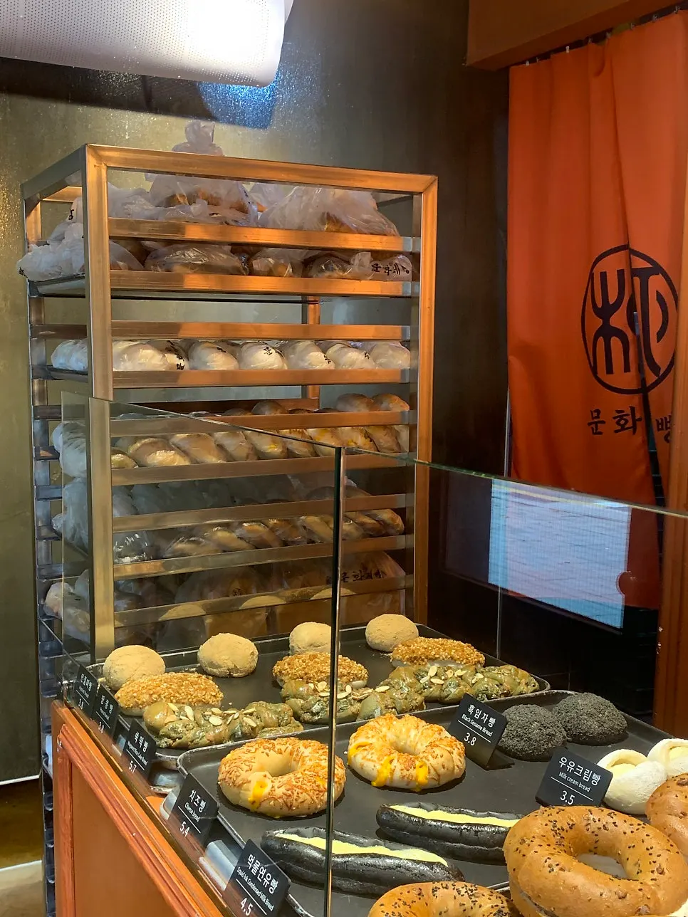 Waiting outside the takeaway-focused Munhwa Bakery