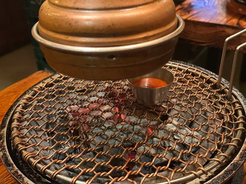 Myeoljeot sauce set over the charcoal