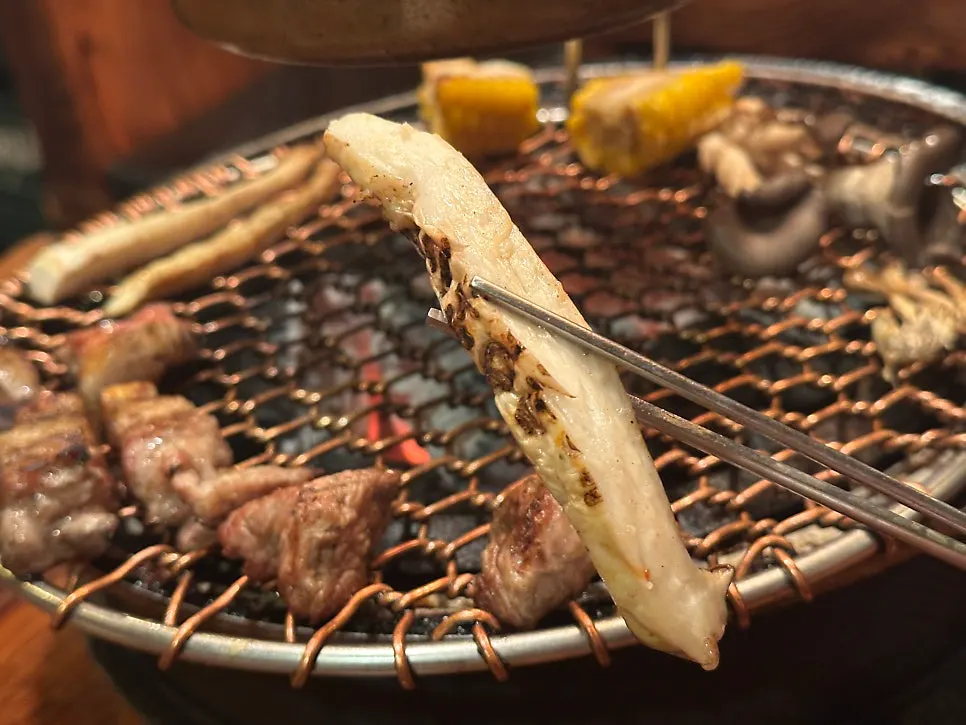 Pork finishing up on the charcoal grill