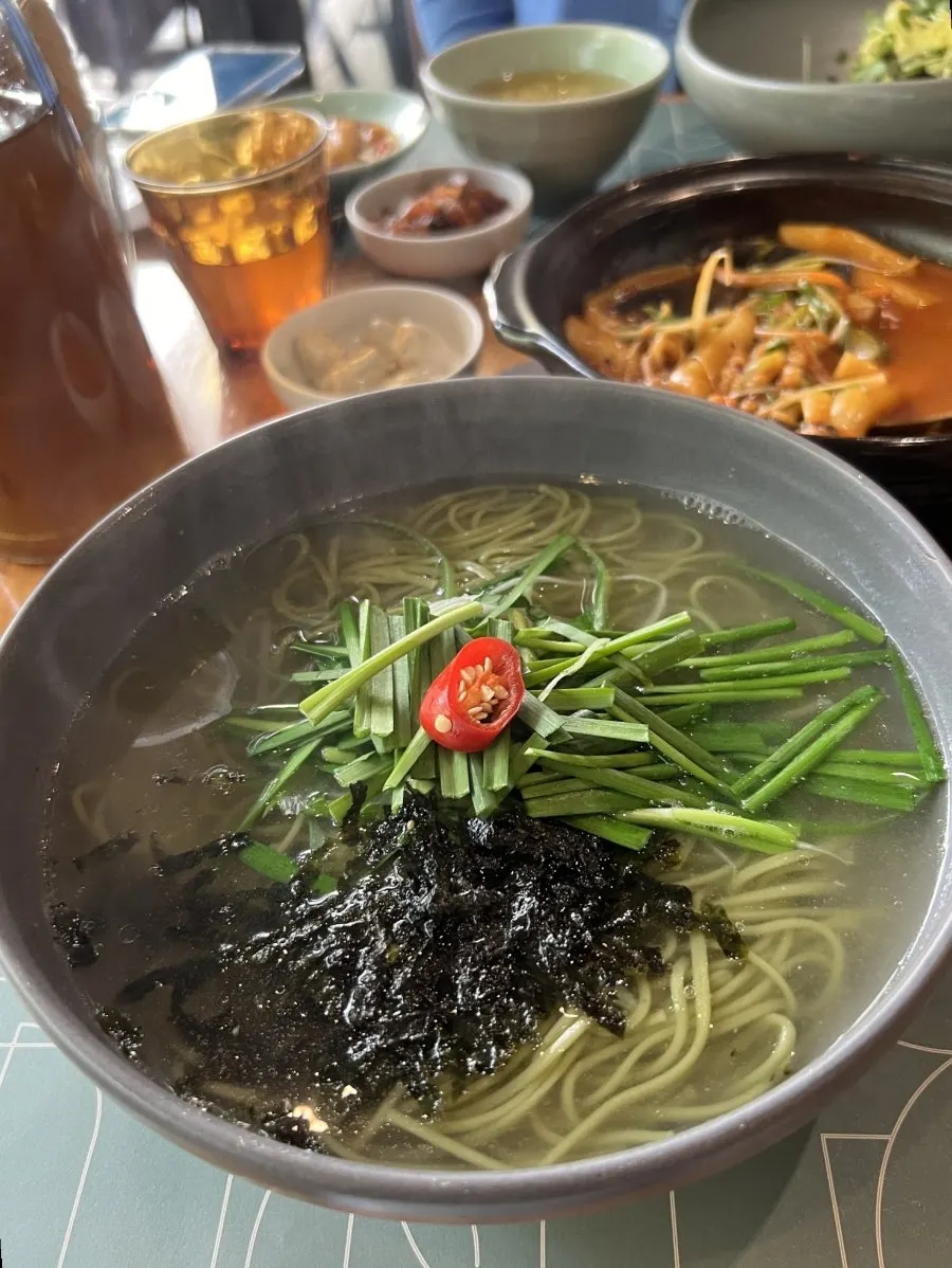 A bowl of SABAL's signature chicken noodle soup