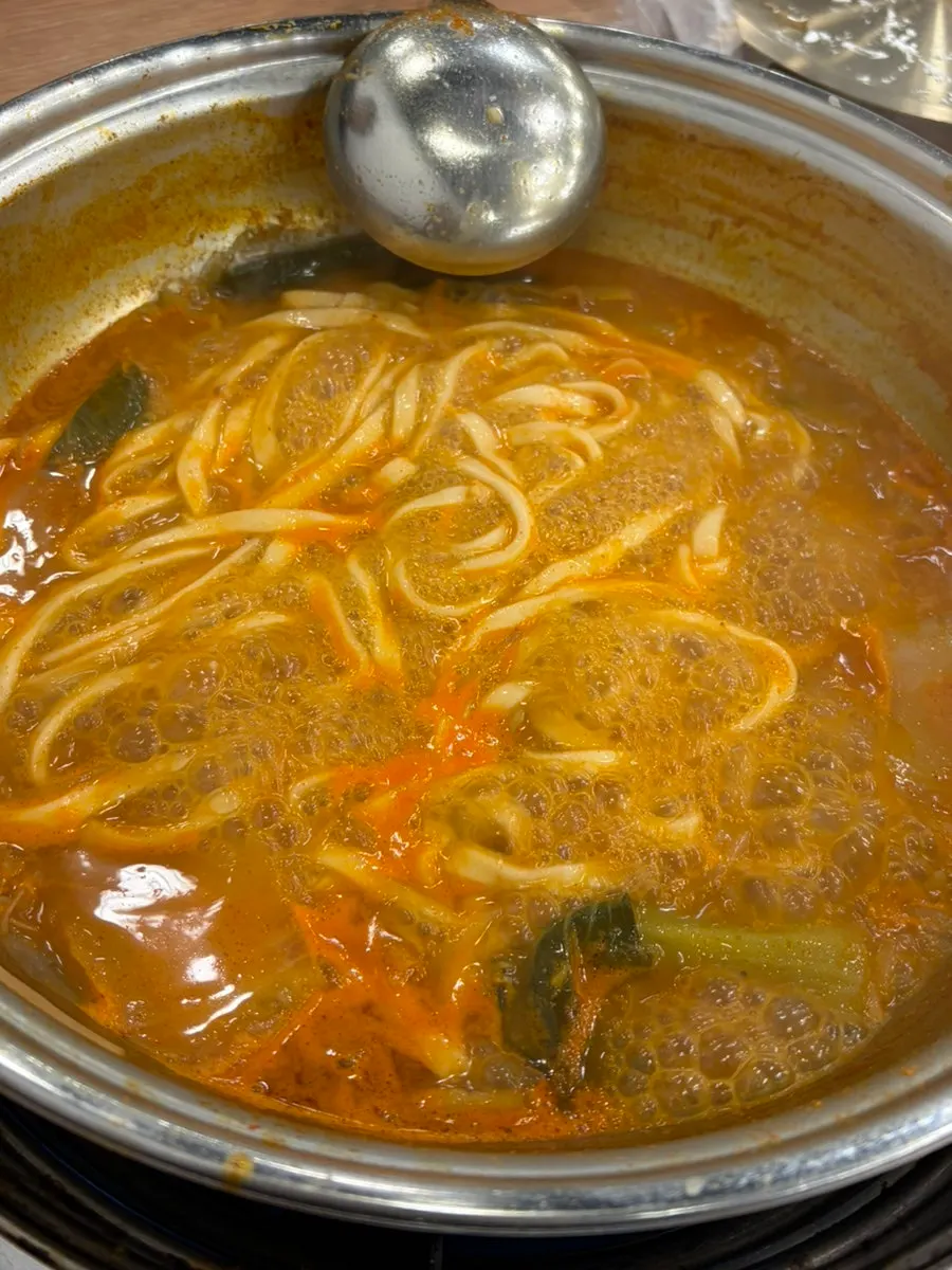 Kalguksu noodles served after the hot pot
