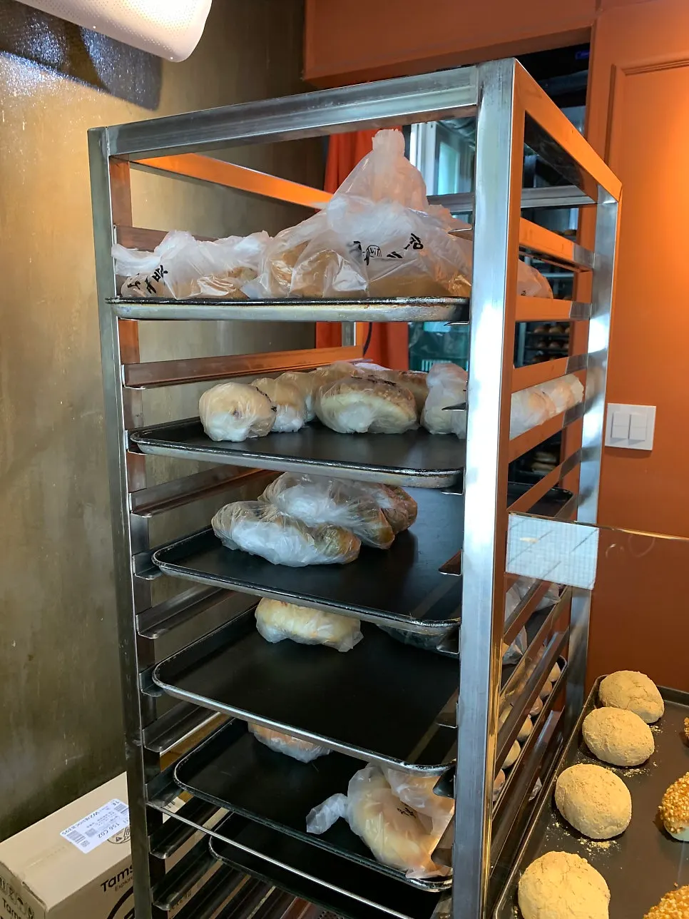 Display case with coffee bread and maple cream cheese bread