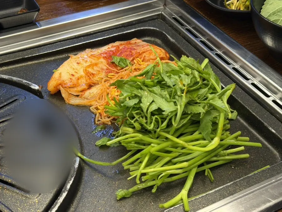 Side dishes and apron already set up on the table