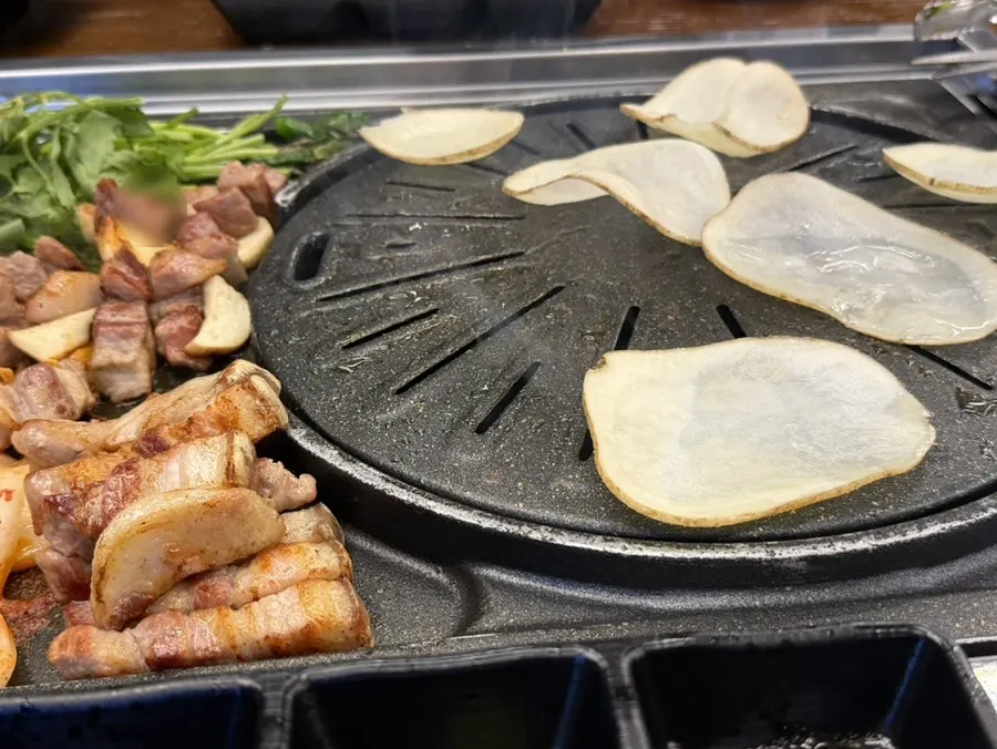 A wrap of meat with vegetables