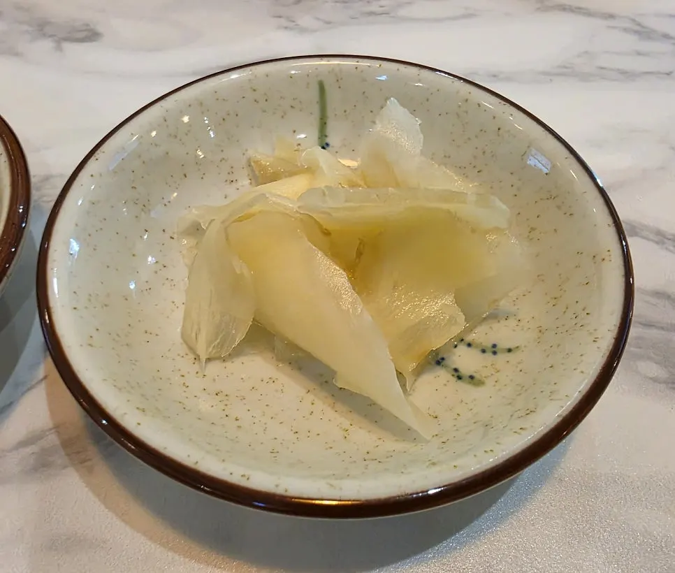Rakkyo and ginger in a small dish