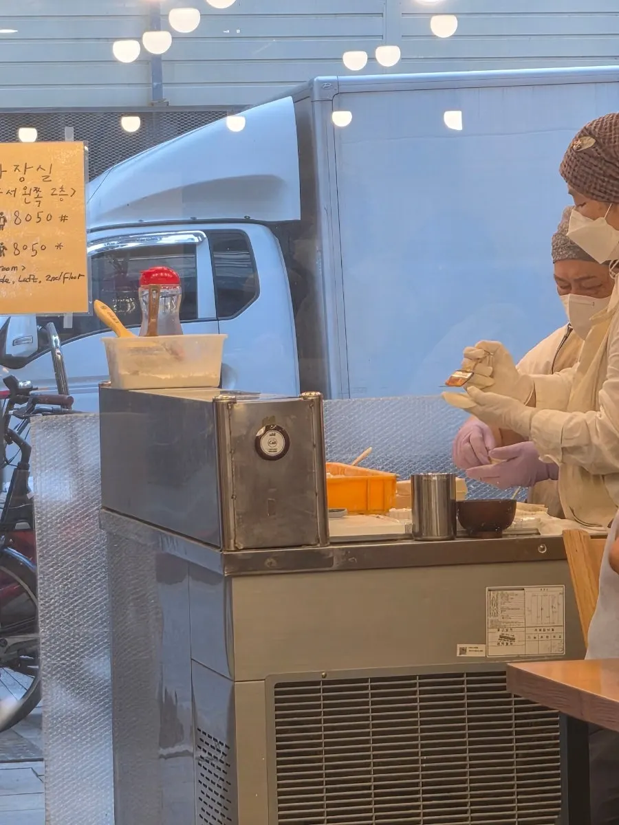 Dumplings being hand-made at the entrance of the restaurant