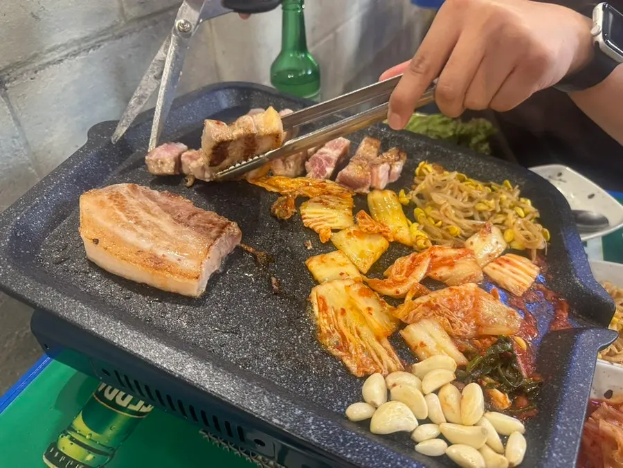 Cross-section of well-grilled aged pork belly