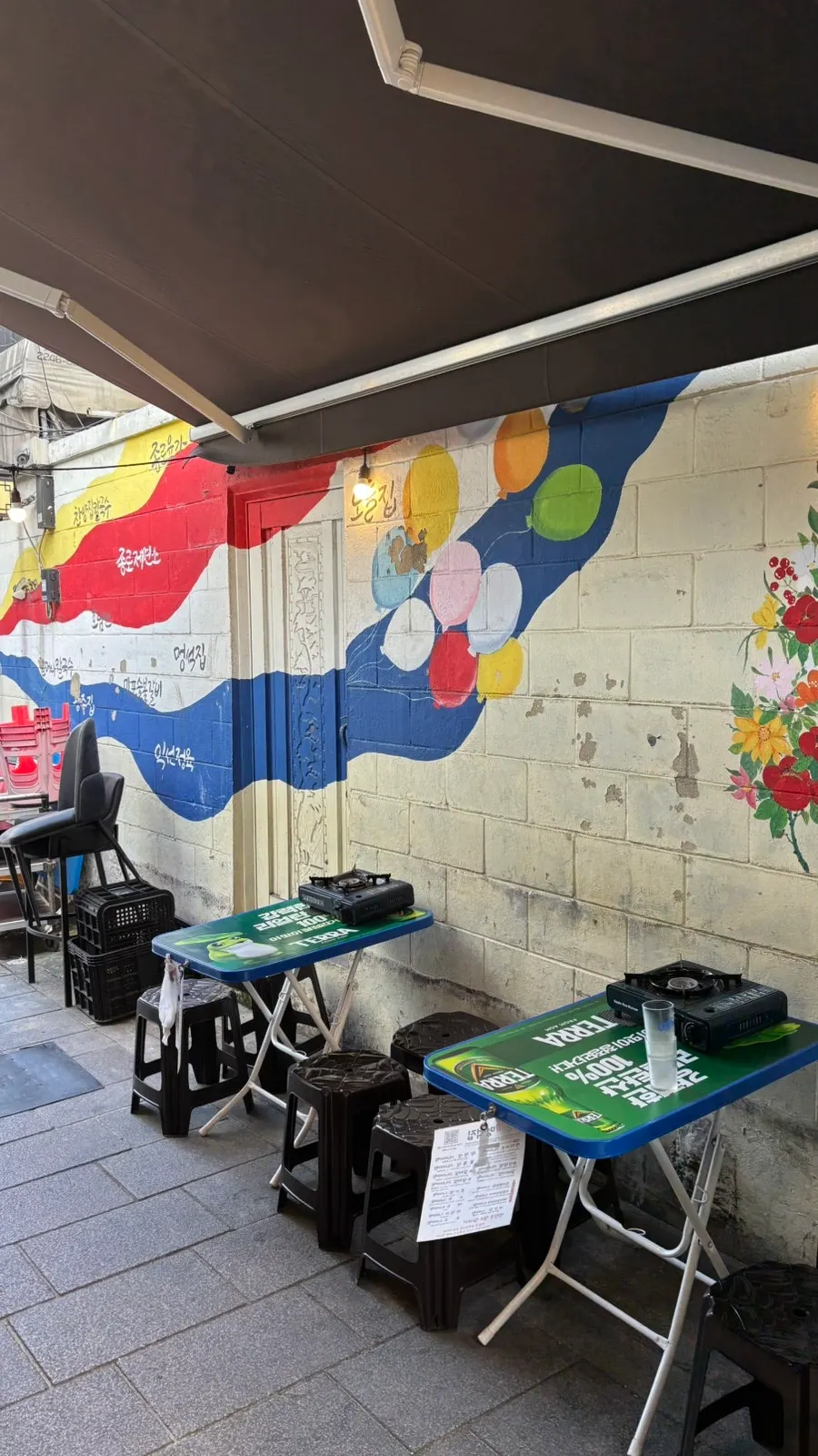 Indoor seating with outdoor-stall vibes at Meongseokjip