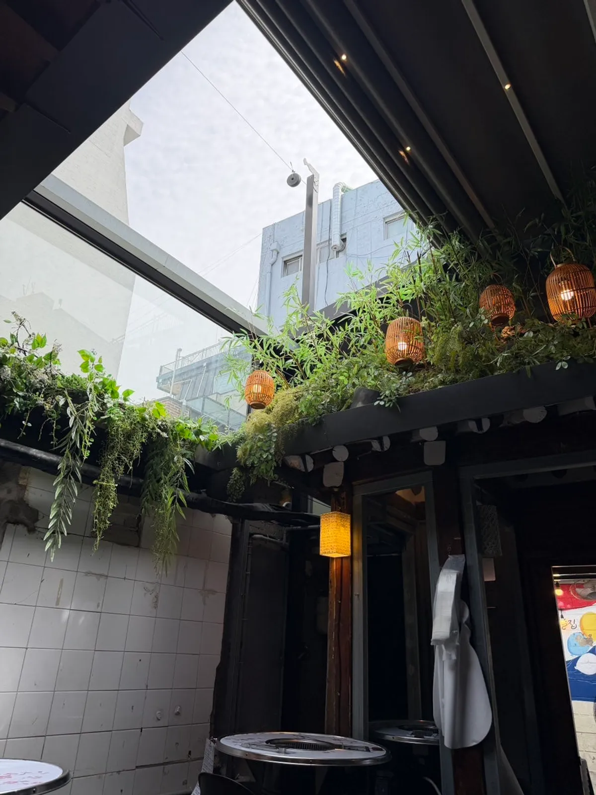 Outdoor seating with Korean tent-bar atmosphere at Meongseokjip