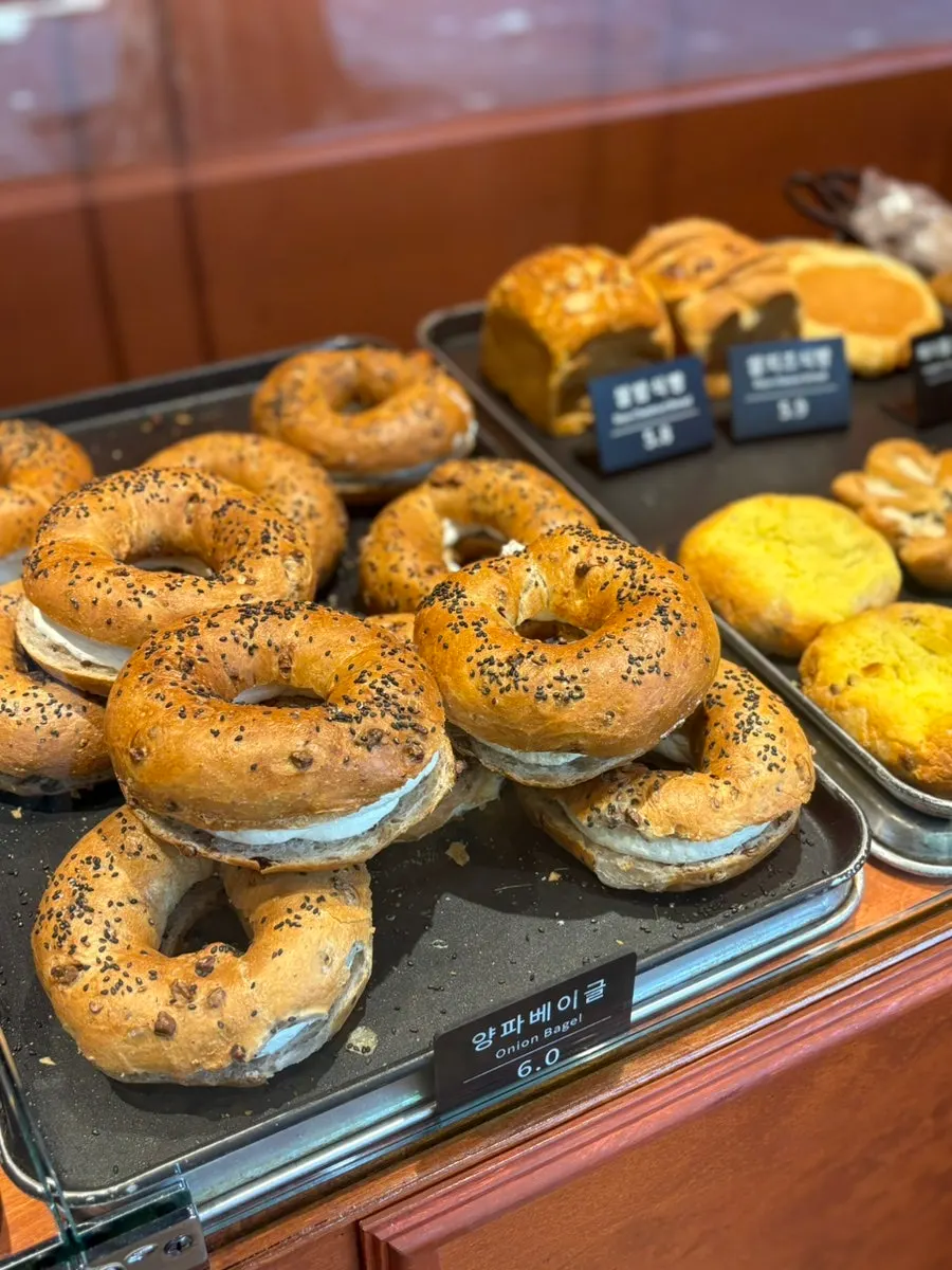 Choosing bread for a picnic from the display