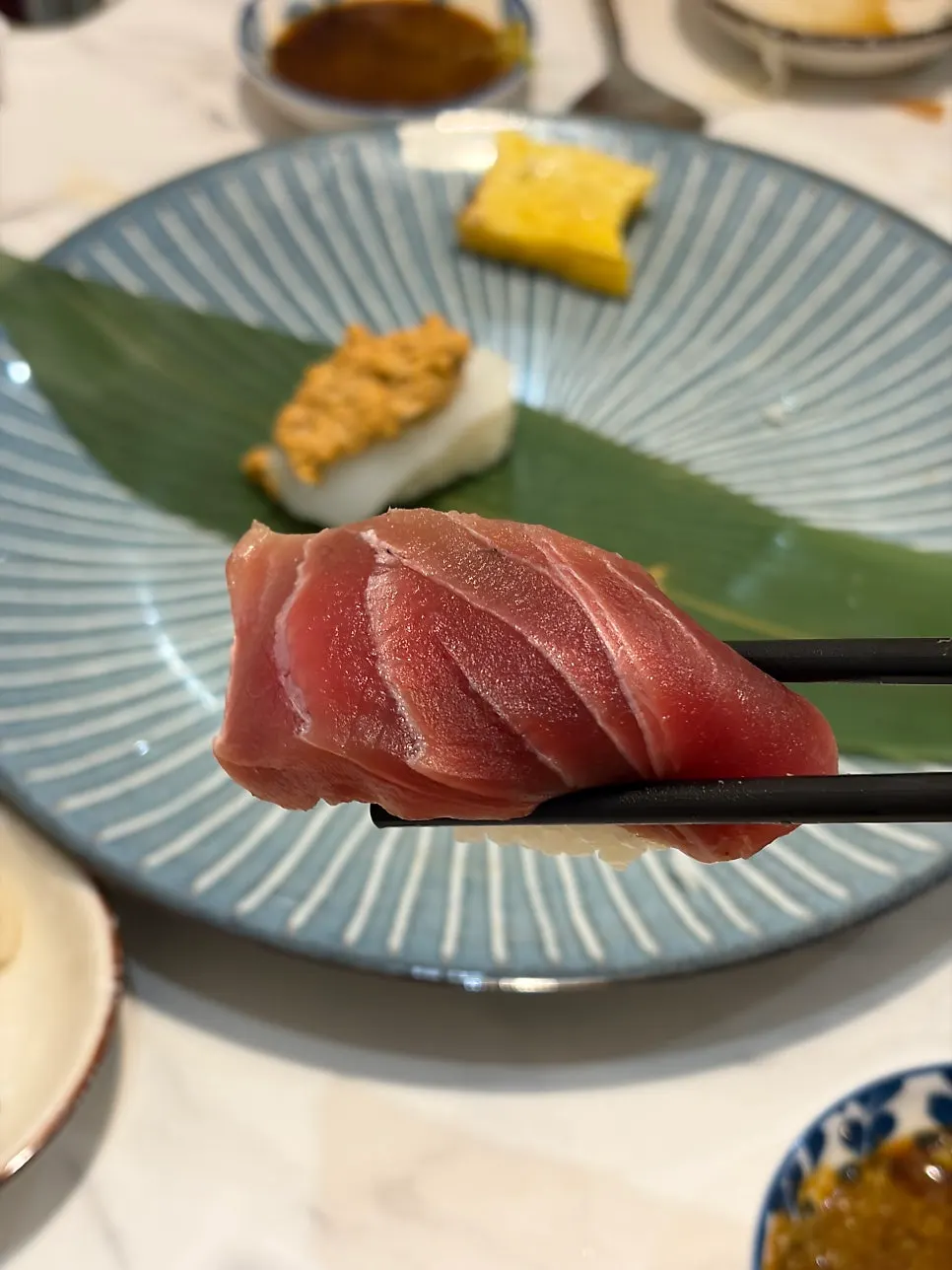 A piece of tuna belly sushi