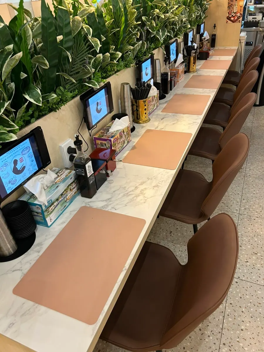 Long table seating inside the restaurant