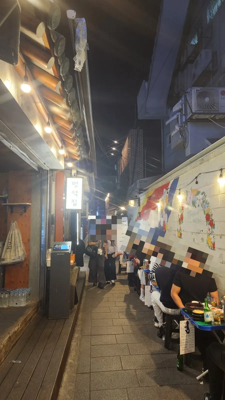 Vertical shot of the street-BBQ alley at Meongseokjip