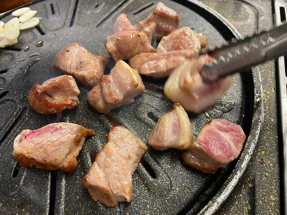 Black pork neck on the grill plate