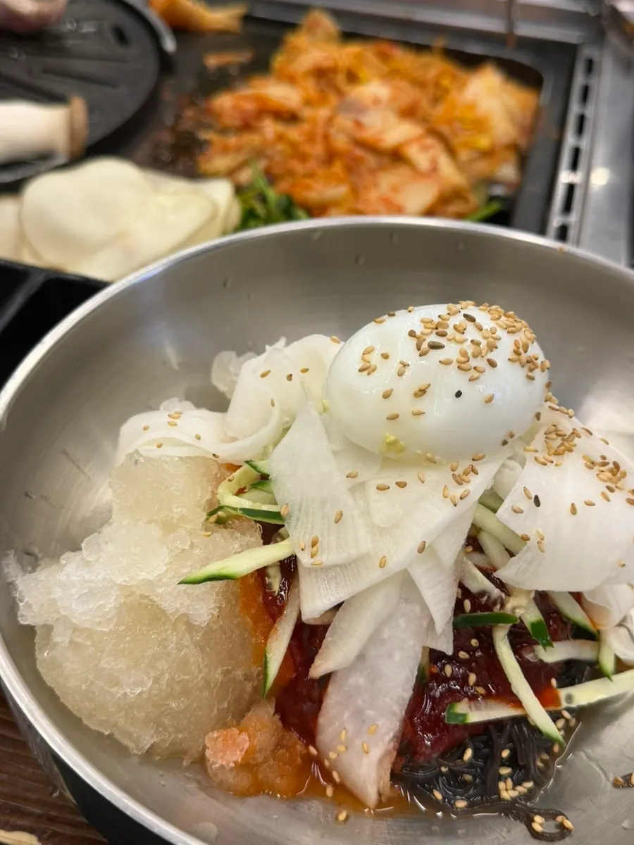 Close-up of samgyeopsal turning golden brown