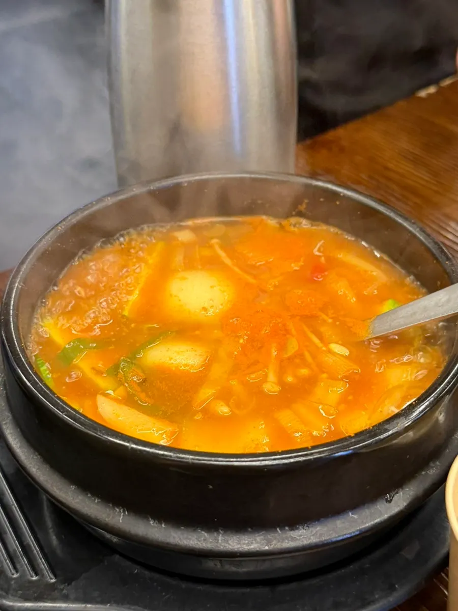 Dessert doenjang jjigae with a bowl of rice