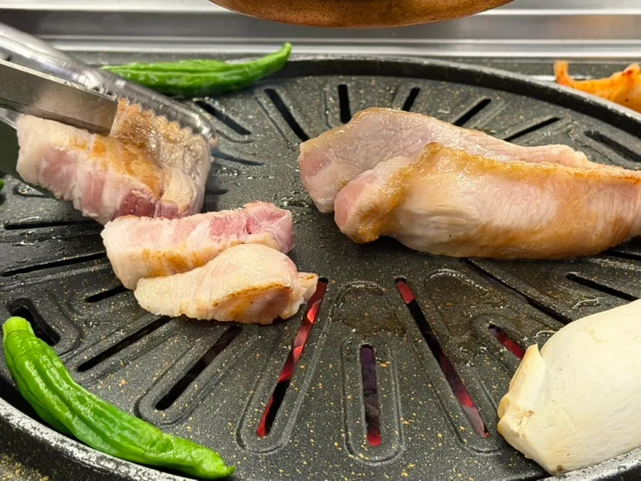 Table set with both meat and dessert dishes