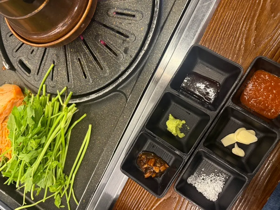 Table setting of pork belly at Cham Dwaejitgan Jongno Main Branch