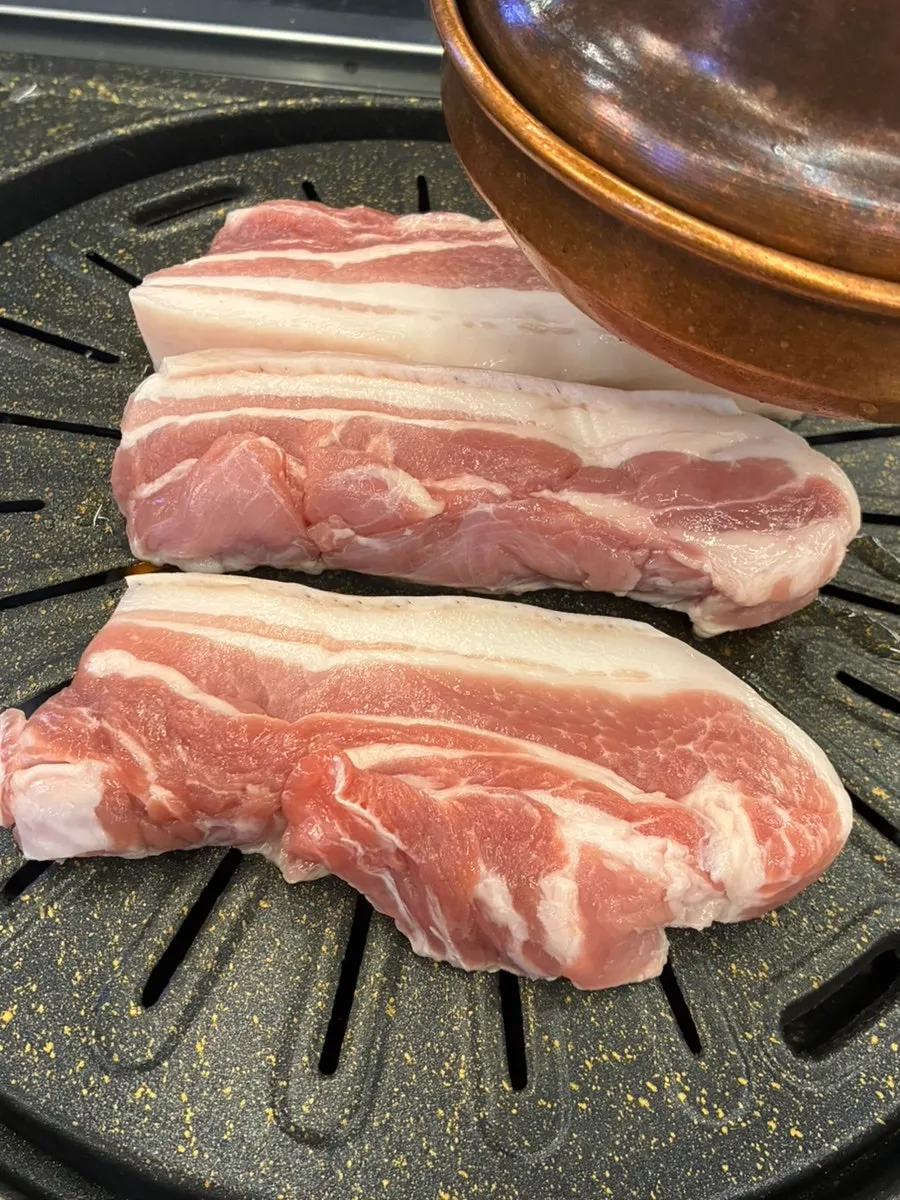 Raw samgyeopsal with a balanced fat layer