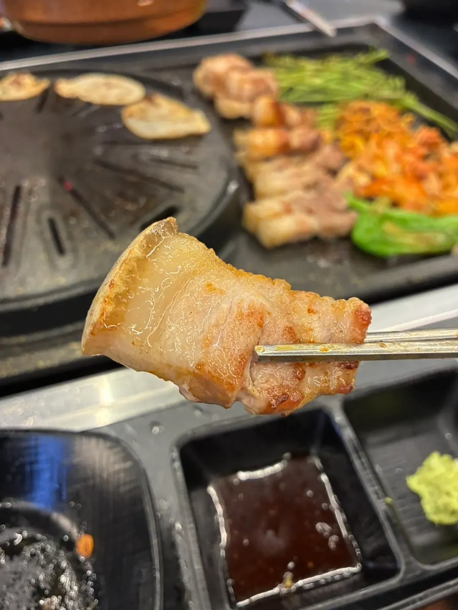 Grilled black pork ogeopsal with the skin still attached