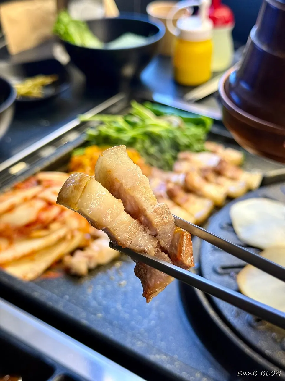 A golden-brown piece of grilled black pork five-layer belly