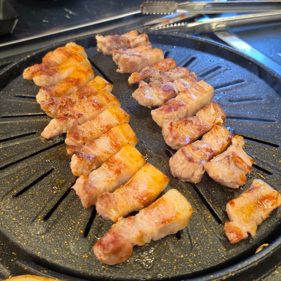 Pork belly grilled by the staff