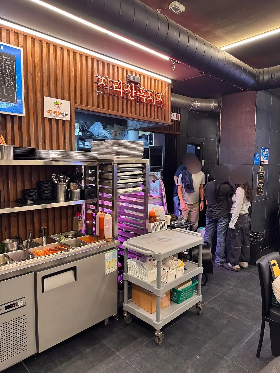 Tables filled with customers during the evening dinner rush